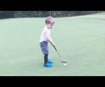 Kids golfing - Wes gives it the tiger woods fist pump after making this put @ 3 years old