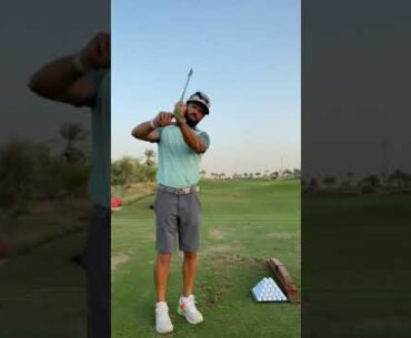 What do the wrists do in the golf swing?