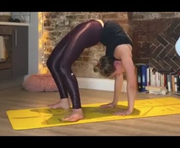 Wheel Yoga Pose In Spandex Leggings