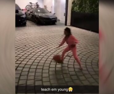 Bronny James little sister, Zhuri, throws up the perfect alley-oop for driveway-court dunk