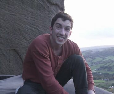 Tyler Landman climbs Smiling Buttress at Curbar