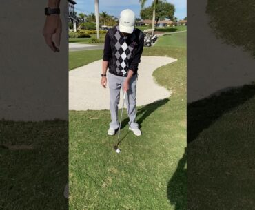Downhill pitch shot