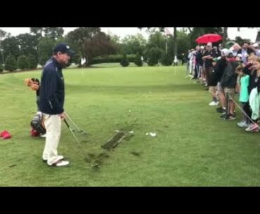 Golf legend Tom Watson gets help from young fan