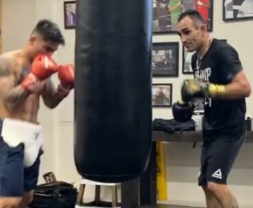 MARK MAGSAYO AND TONY FERGUSON WORKING THE HEAVY BAG TOGETHER!