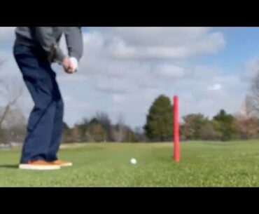 throwing a wedge to a front pin from 120 out - great golf shot
