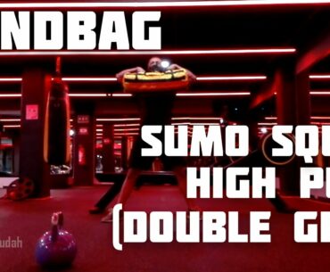 Sumo Squat Sandbag High Pull Double Grip