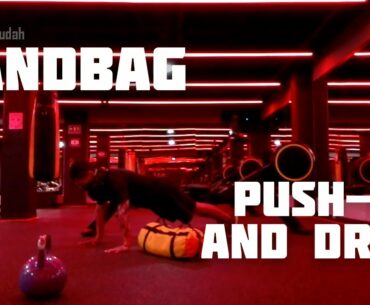 Sandbag Push Up And Drag