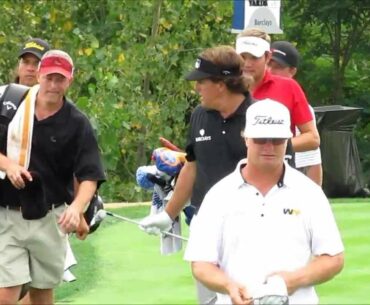 Phil Mickelson tees off on the 18th at Liberty National, 2013 Barclays practice round