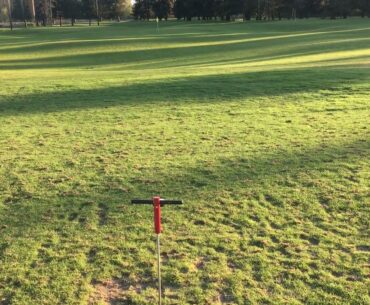 Soil compaction driving range tee