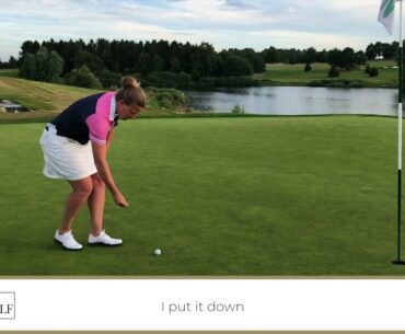 Marking a golf ball, KM landscape
