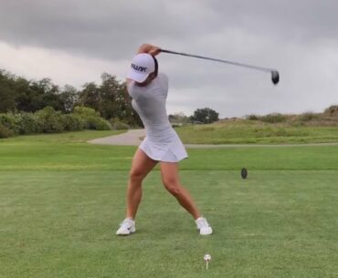 Ladies Golfer Crushing Driver