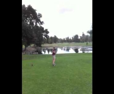 Bella hitting over pond