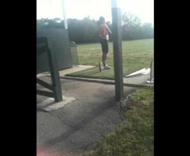 Young lady golf swing