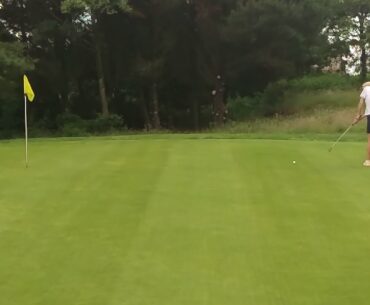 Lady Golfer Putts For Eagle...(nett)