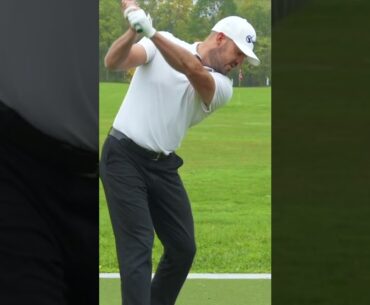 Stay down in your golf swing with this move #shorts #golfswing #golf #ericcogorno