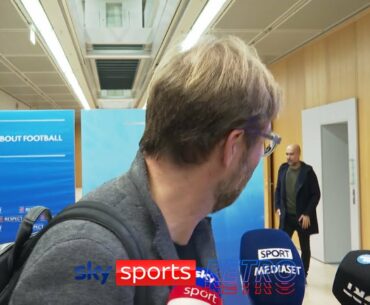 Jurgen Klopp runs away from Pep Guardiola