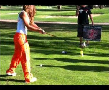 Hooters Girls playing in the Strikeforce Golf Tournament