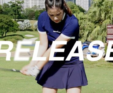 Release - split second between life and water - Golf with Michele Low