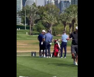 Watch Rory McIlroy ignore Patrick Reed when he tries to say hi and after he throws a tee in Dubai