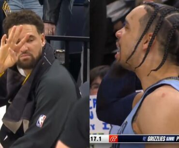 Klay Thompson shows Dillon Brooks how many rings he has as they talk trash from the bench