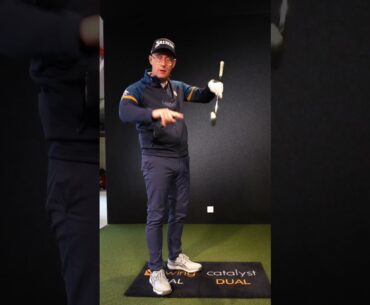 STOP hitting down at the golf ball (golf swing tips)
