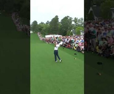 Fore, please. Tiger Woods now driving.