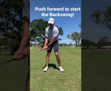 Initiate the backswing by pressing into the front foot first.