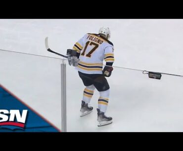 Bruins' Nick Foligno Leaves Game With Apparent Injury After Hit By Flames' Zadorov