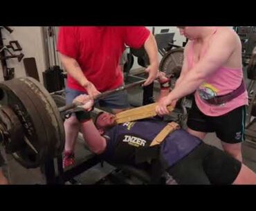 Matt Wallace Benching 445+80 lbs of chains x 2 off of a 2 board