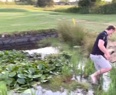 Paul plays golf in the water