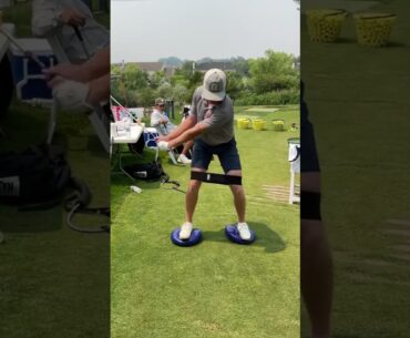 Working on reducing sway and slide in backswing - 3 drills one student!