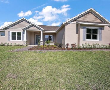 FOR SALE NEW BUILT 2023 GATED COMMUNITY LADY LAKE FL NEAR DISNEY CORNER LOT 1/2 ACRE $699,990.00