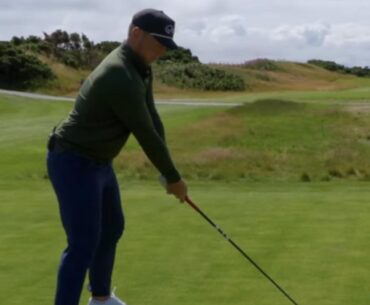 Why does Brad align the ball on the heel of his driver?