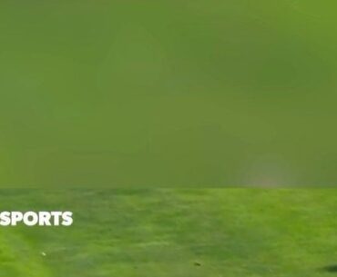 Steph Curry runs after making hole in one