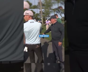 Players’ shot lands on a moving golf car