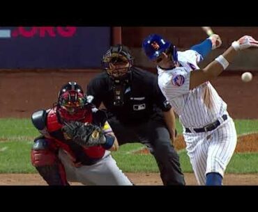 Sean Murphy gets hit in the head by Mark Vientos' bat