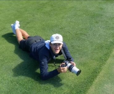 Ryder getting close up footage of two balls touching on the green.