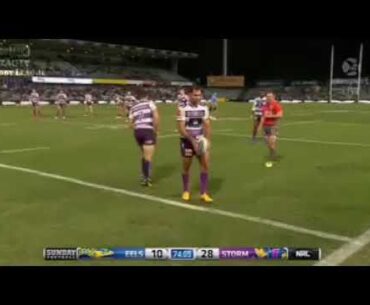 Cameron Smith kicks the ball to a Parramatta Eels fan