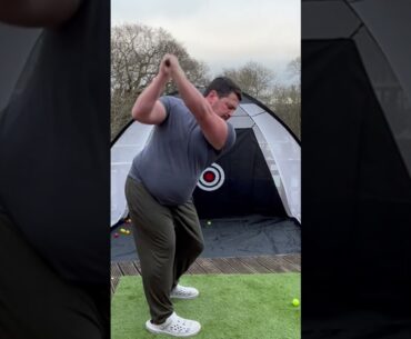 GOLF SWING IS IN PROGRESS