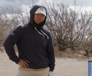 Kwon looks like a woman posing in front of the Eiffel Tower