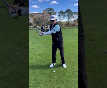When do we use our hands to start releasing the club from the top of the golf swing?