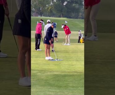 Golfer practicing putting