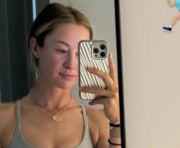 Bra-less Nelly Korda shines in a black dress
