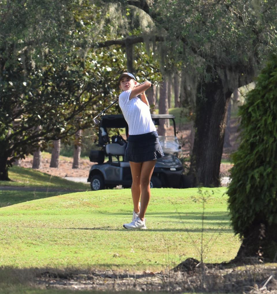 Kai Trump, Benjamin golfer and granddaughter of President-elect Donald Trump, drives the ball on Hole 11 of the Class 1A state championship on Nov. 12, 2024.