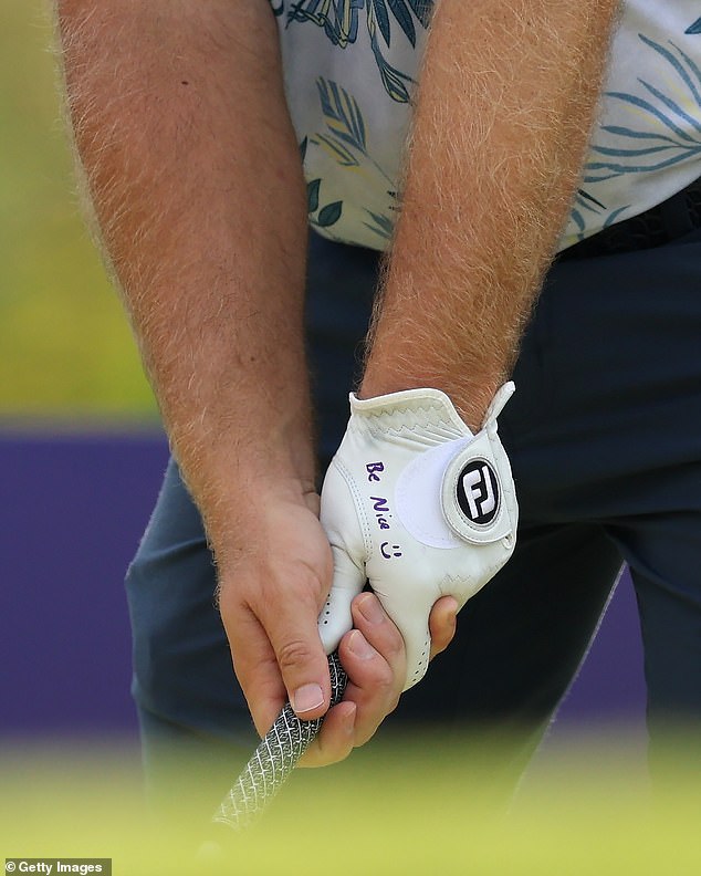 On Sunday Hatton appeared to have written a little message to himself on his golf glove that read: 'Be nice' with a smiley face