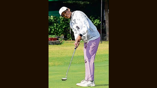 A golfer in action during the ongoing championship at the Chandigarh Golf Club. (HT Photo)