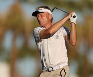 Bernhard Langer of Germany plays his second shot on the 14th hole during the third round of the Charles Schwab Cup Championship.
