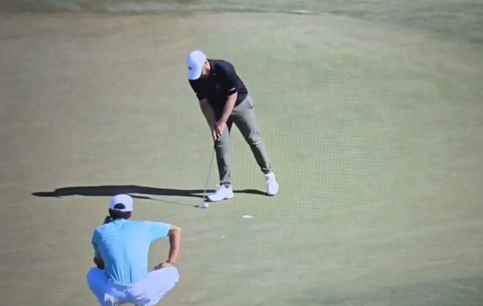 Hatton bent over to tap his ball home, thinking it would be an easy par