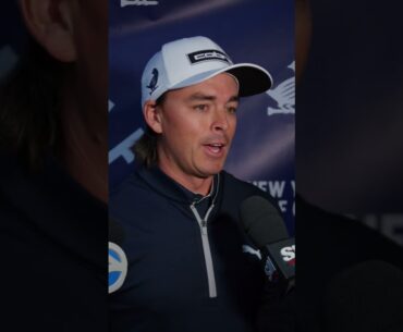Rickie Fowler and Eli Manning take swings at a golf simulator