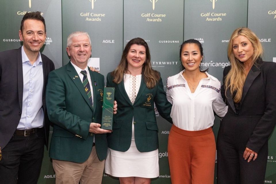 Co Sligo Golf Club captains Robbie Fitzpatrick and Niamh Crowley collect the award for golf course of the year.